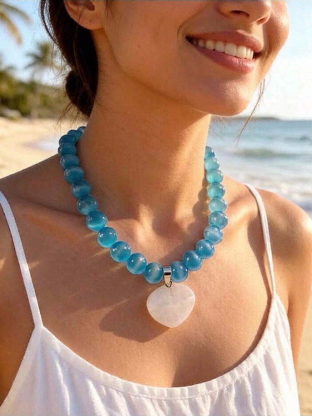 Anthropologie Blue Beaded Necklace with White Heart Pendant - Picture 4 of 8